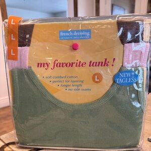 3 pack Tank Tops
Colors: green, pink & brown
Woman’s Size Large